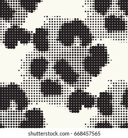 Seamless pattern ethnic style. Stylized animal skin imitation. Halftone textile print. Tribal fashion background. Black and white design.