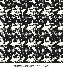 Seamless pattern ethnic style. Stylized animal skin imitation. Halftone textile print. Tribal fashion background. Black and white design.