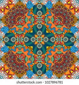 Seamless pattern in ethnic traditional style. Abstract vintage pattern with decorative tiles pattern. Vector oriental style in orange, blue and brown colors.