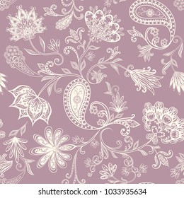 Seamless pattern in ethnic traditional style. Abstract vintage pattern with decorative flowers, leaves and Paisley pattern in Oriental style.