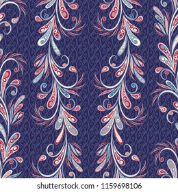 Seamless pattern in ethnic traditional style. Abstract vintage pattern with decorative flowers, leaves and Paisley pattern in Oriental style.