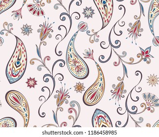 Seamless pattern in ethnic traditional style. Abstract vintage pattern with decorative flowers, leaves and Paisley pattern in Oriental style.