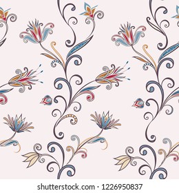 Seamless pattern in ethnic traditional style. Abstract vintage pattern with decorative flowers, leaves and Paisley pattern in Oriental style.