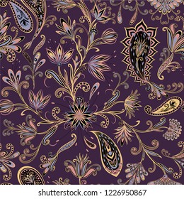 Seamless pattern in ethnic traditional style. Abstract vintage pattern with decorative flowers, leaves and Paisley pattern in Oriental style.