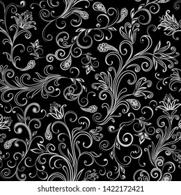 Seamless pattern in ethnic traditional style. Abstract vintage pattern with decorative flowers, leaves and Paisley pattern in Oriental style.