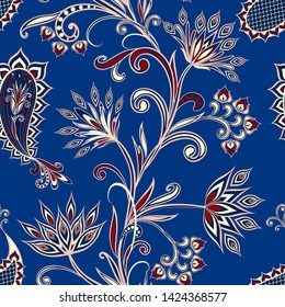 Seamless pattern in ethnic traditional style. Abstract vintage pattern with decorative flowers, leaves and Paisley pattern in Oriental style.