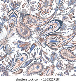 Seamless pattern in ethnic traditional style. Abstract vintage pattern with decorative flowers, leaves and Paisley pattern in Oriental style.