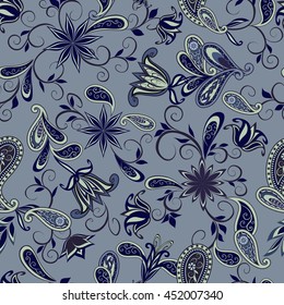 Seamless pattern in ethnic traditional style. The pattern of flowers and Paisley in Indian style.