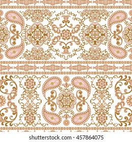 Seamless pattern in ethnic traditional style. The pattern of flowers and Paisley in Indian style.