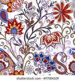 Seamless pattern in ethnic traditional style. The pattern of mandalas and Paisley pattern in Indian style.