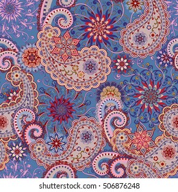 Seamless pattern in ethnic traditional style. The pattern of mandalas and Paisley pattern in Indian style.