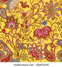 Seamless pattern in ethnic traditional style. The pattern of mandalas and Paisley pattern in Indian style.