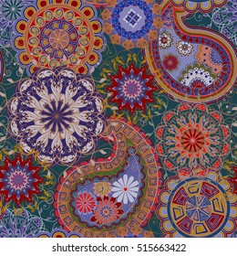 Seamless pattern in ethnic traditional style. The pattern of mandalas and Paisley pattern in Indian style.