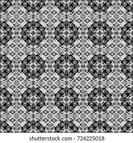 Seamless pattern in ethnic traditional style. Abstract vintage pattern with decorative tiles pattern. Vector oriental style in white, gray and black colors.