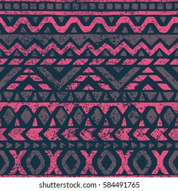 Seamless pattern in ethnic and tribal style. Grungy texture. Handmade. Pink and purple colors. Vintage dark print. Vector illustration.