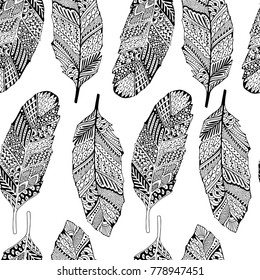 Seamless pattern with ethnics feathers.