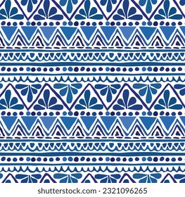 seamless pattern with etnic and abstract geometric elements in blue colors. vector desingn for fabric print 