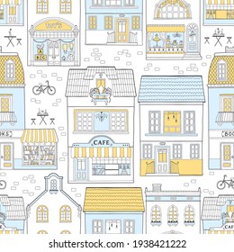 Seamless pattern with European houses. Dutch buildings with shops, bookstore, coffee shop. Colorful vector illustration in a hand-drawn childish style. Traditional architecture of the Netherlands.