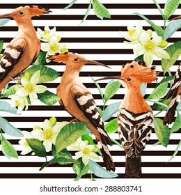 Seamless pattern with exotic birds, tropical leaves and white flowers. Vector background.