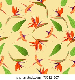 Seamless pattern. Exotic flowers and birds on a yellow background.