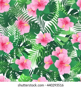 Seamless pattern with exotic hibiscus flowers and palm leaves. Endless tropical texture. 
