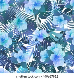 Seamless pattern with exotic hibiscus flowers and palm leaves. Endless tropical texture.