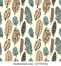 Seamless pattern with exotic or indian feathers. Wildlife concept made in vector. For your design, textile, fabric, surface textures, packaging, scrapbooking, party decorations, gift wrap.