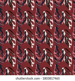 Seamless pattern with exotic monstera leaf silhouettes. Maroon background. Stylized artwork with tropical elements. Perfect for wallpaper, textile, wrapping paper, fabric print. Vector illustration.
