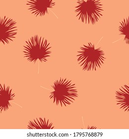 Seamless pattern with exotic  palm leaves.  Warm colors. Vector illustration.