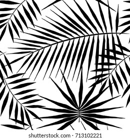 Seamless pattern of exotic palm trees. Black leaves on white background. Tropical jungle leaf.