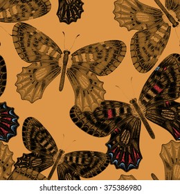 Seamless pattern with exotic tropical butterflies on gold background. A series unique design with foil. Template for making paper, wall paper, fabrics, textiles, packaging. Vintage. Victorian style.