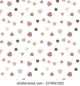 Seamless pattern with exquisite discreet pink, beige and brown hearts on white background for plaid, fabric, textile, clothes, tablecloth and other things. Vector image. 