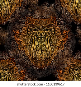 Seamless pattern - Exquisite golden ornate stylized Owl against the background of the mandala. Spiritual, esoteric, totem symbol. Ethnic tribal patterns with elements of Ar Nouveau and Boho.