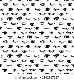 Seamless pattern with eyes and eyelashes. Ink illustration. Ornament for wrapping paper. Monochrome design.