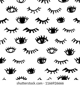 Seamless pattern with eyes and eyelashes. Ink illustration. Ornament for wrapping paper. Monochrome design.