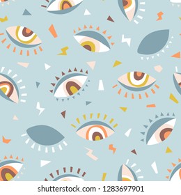 Seamless pattern with eyes, rainbows and stars. Mystical print. Vector hand drawn repeat background design for fabric or wrap paper.