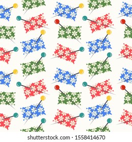 Seamless pattern fabric scraps pinned with sewing pins