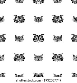 Seamless pattern with the face of an owl, a forest bird on a white background. Suitable for poster, postcard, banner, textile and menu design. Vector illustration.