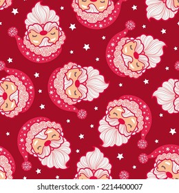 Seamless pattern with faces of Santa Claus on a red background.For Christmas and New Year's design of fabric, wallpapers, backgrounds, tissue paper and so on. Vector