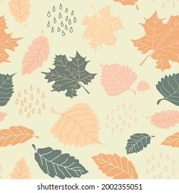 Seamless pattern of  fall  leaves. Vector background with  autumn leaves and raindrops. Perfect for printing on the fabric, design package and cover
