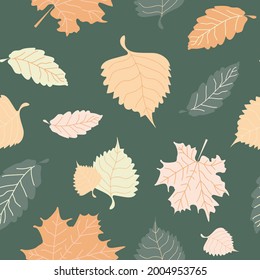 Seamless pattern of  fall  leaves. Vector background with  autumn leaves on green. Perfect for printing on the fabric, design package and cover