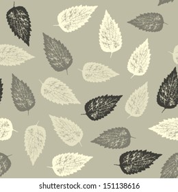 Seamless pattern with fallen leaves on light background