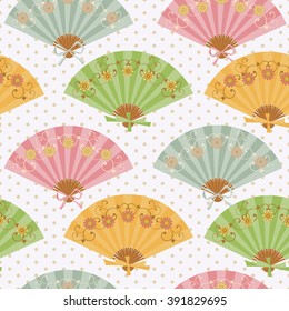 Seamless pattern with fans. Multi-colored fan with flower pattern in Oriental style.