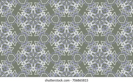 Seamless pattern. Fantastic colored snowflakes are located like bees' honeycombs. Drawing for wallpaper, textiles and holiday backgrounds. Green-gray, purple-gray, pale gray.