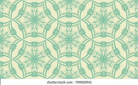 Seamless pattern. Fantastic snowflakes are located like bees' honeycombs. The abstract six-sided figures. For backgrounds, fabrics, holidays. Green-yellow.