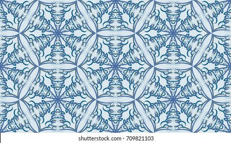 Seamless pattern. Fantastic snowflakes are located like bees' honeycombs. The abstract six-sided figures. For backgrounds, fabrics, holidays. Blue-gray tones.