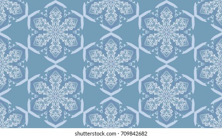 Seamless pattern. Fantastic snowflakes are located like bees' honeycombs. The abstract six-sided figures. For backgrounds, fabrics, holidays. Blue-gray-green.