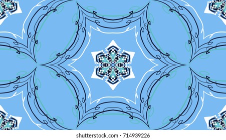 Seamless pattern. Fantastic snowflakes are located in openwork honeycomb.
