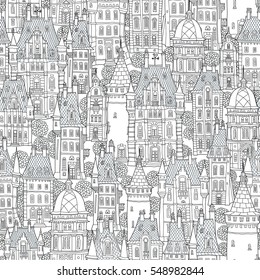 Seamless pattern of fantasy urban landscape. Fairy tale castle, old medieval town.Hand drawn sketch, house,tower silhouette.T-shirt print.Coloring book page for adults, children.Black and white doodle