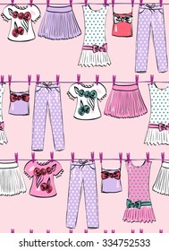 Seamless pattern. Fashionable beautiful clothes for little girls
